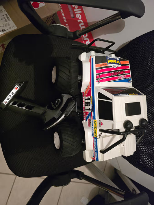 [USED]Tamiya - Mitsubishi - Built ready to run 1:10 sold with rechargeable Flysky controller