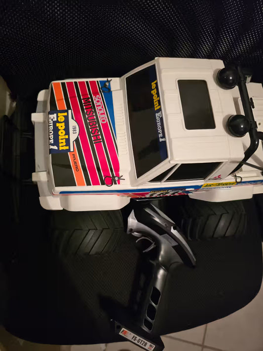 [USED]Tamiya - Mitsubishi - Built ready to run 1:10 sold with rechargeable Flysky controller